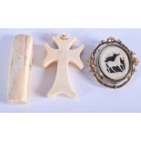 AN ANTIQUE CARVED IVORY CRUCIFIX together with a brooch etc. (3)