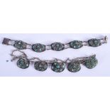 AN EASTERN SILVER AND TURQUOISE NECKLACE together with matching bracelet. (2)