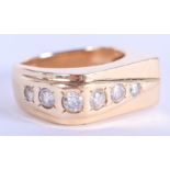 A DESIGNER 14CT GOLD AND DIAMOND RING by Cole. 10.8 grams. N/O.