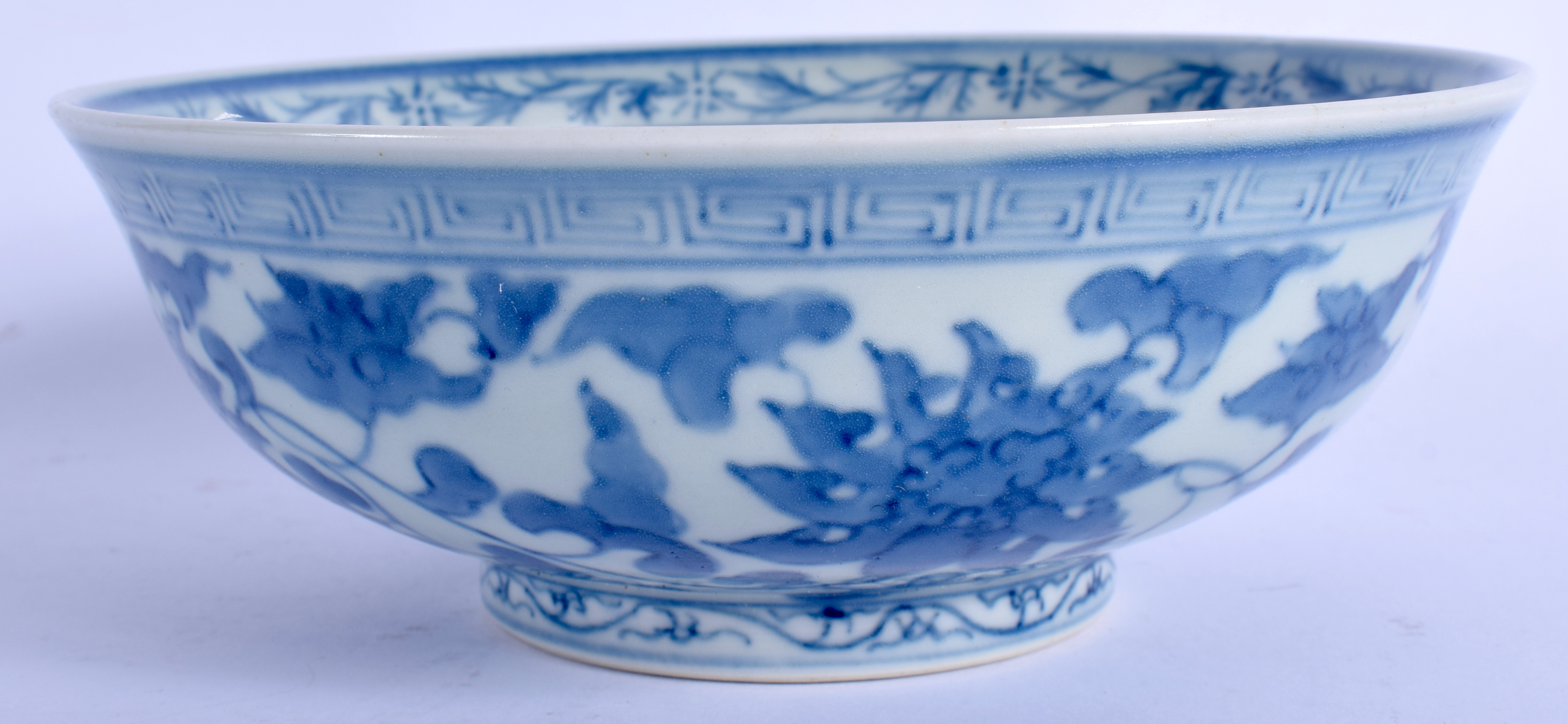 A CHINESE BLUE AND WHITE PORCELAIN BOWL BEARING KANGXI MARKS. 17.5 cm wide.