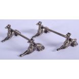 A PAIR OF VINTAGE HOUND AND RIDING CROP KNIFE RESTS. 8 cm wide.