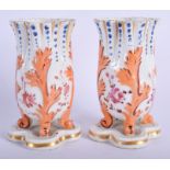 A PAIR OF ANTIQUE FRENCH PORCELAIN SPILL VASES. 12.5 cm high.