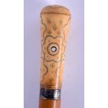 AN EARLY 18TH CENTURY SILVER INLAID IVORY PIQUE WORK WALKING CANE with stud work decoration. 93 cm