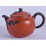 A CHINESE YIXING POTTERY TEAPOT AND COVER. 12.5 cm wide.