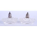 A PAIR OF VINTAGE SILVER TOPPED GLASS SALTS. 9 cm wide.