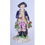 18TH C. DERBY FIGURE OF A BOY WITH DOG AND GUN. 12.5cm high and 6cm wide