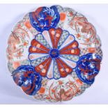 A 19TH CENTURY JAPANESE MEIJI PERIOD IMARI DISH painted with flowers. 30 cm wide.