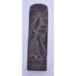 A CHINESE BROZE SEAL, decorated in relief with a mountainous landscape. 9.5 cm long.