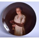 A VIENNA PORCELAIN DISH DEPICTING A GIRL, “Good Night”. 24.5 cm wide.