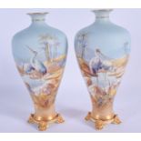 A FINE PAIR OF 19TH CENTURY ROYAL WORCESTER VASES by Powell, painnted with birds within landscapes.