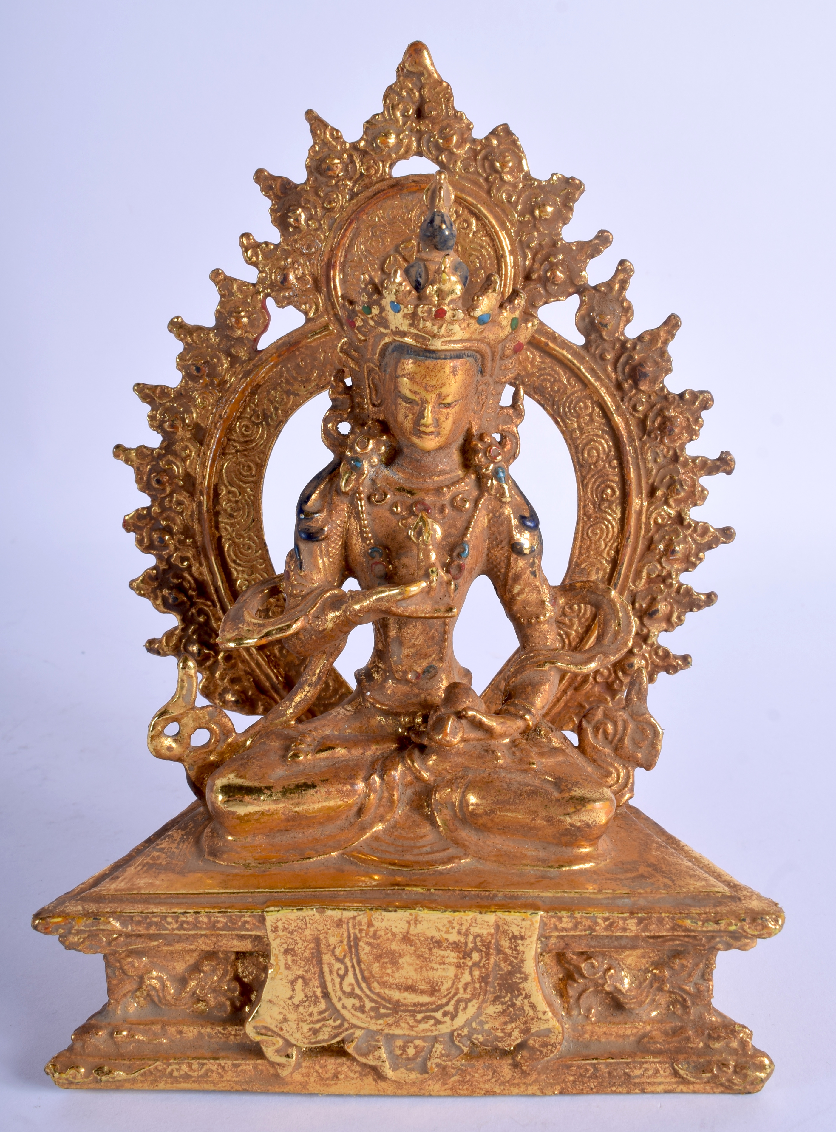 A CHINESE SINO TEIBTRAN BRONZE BUDDHA, formed seated upon a flaming shrine. 19 cm x 12.5 cm.