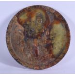 A CHINESE JADE ROUNDEL. 15 cm diameter.