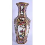 A CHINESE FAMILLE ROSE PORCELAIN VASE BEARING QIANLONG MARKS. 28.5 cm high.