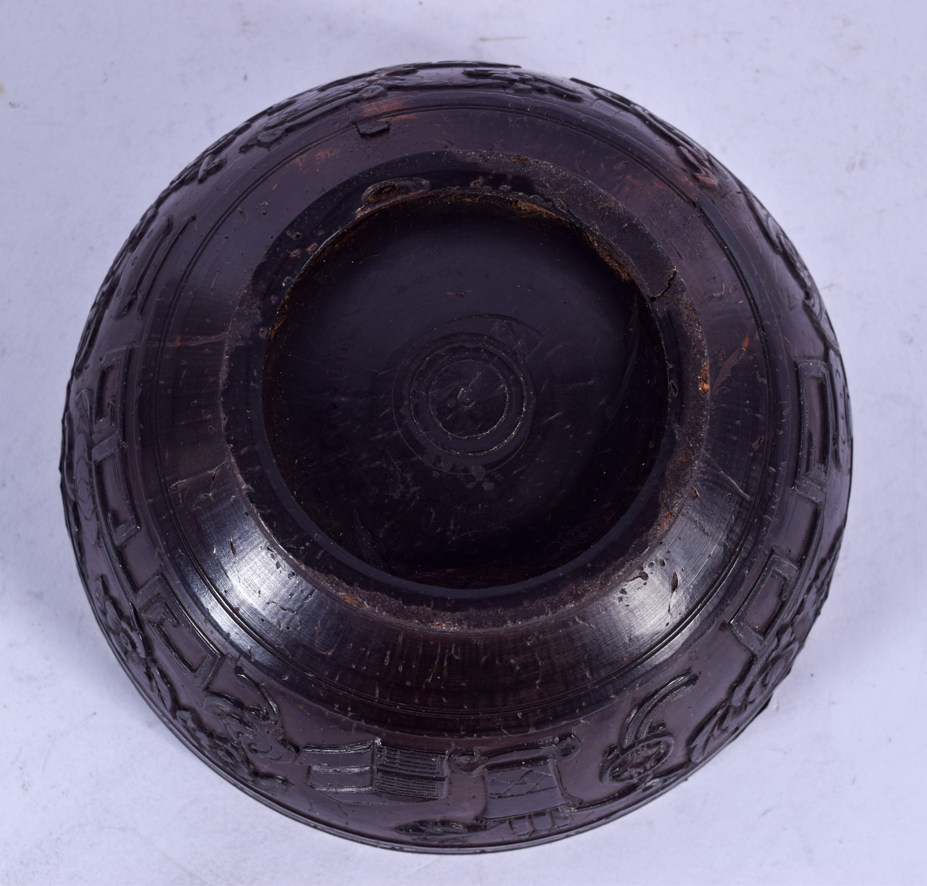 A CHINESE QING DYNASTY COCONUT SHELL BOWL, carved witrh precious objects. 11 cm wide. - Image 3 of 3