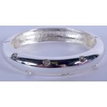 A JON RICHARD CRYSTAL BANGLE. 7 cm wide.