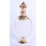 AN ANTIQUE GOLD MOUNTED FRENCH SCENT BOTTLE. 11 cm high.