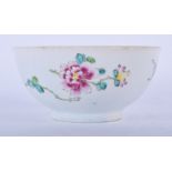 18TH C. BOW FAMILLE ROSE STYLE BOWL PAINTED WITH FLOWERS AND A BUTTERFLY. 5cm high and 11cm wide