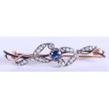 AN ANTIQUE GOLD DIAMOND AND SAPPHIRE BROOCH. 4.4 grams. 5 cm wide.