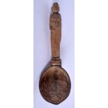 A 19TH CENTURY INDIAN BURMESE CARVED WOOD FIGURAL TRIBAL SPOON with coconut bowl, formed with a term