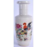 A CHINESE PORCELAIN ROULEAU VASE, dcprated with fwol in a landscape. 28 cm high.