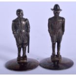 A PAIR OF VINTAGE STERLING SILVER FIGURES. 4 cm high.