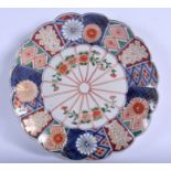 AN EARLY 20TH CENTURY JAPANESE KUTANI PORCELAIN DISH, signed. 24.5 cm wide.