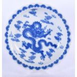 A CHINESE BLUE AND WHITE PORCELAIN DISH BEARING KANGXI MARKS. 22.5 cm wide.