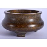 A CHINESE BRONZE CENSER, signed. 8 cm wide.