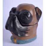 A COLD PAINTED PUG DOG INKWEL. 10 cm high.