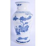 A CHINESE BLUE AND WHITE VASE painted with figures. 21 cm high.