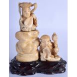 A JAPANESE MEIJI PERIOD IVORY OKIMONO FIGURAL GROUP. Ivory 12 cm x 9 cm.