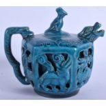 A CHINESE BLUE GLAZED RETICULATED PORCELAIN TEA POT. 16 cm wide.
