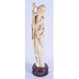 AN EARLY 20TH CENTURY CHINESE CARVED IVORY FISHERMAN modelled holding a ram. Ivory 30 cm high.