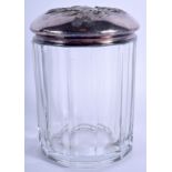 A SILVER TOPPED GLASS JAR. 15 cm x 9 cm.