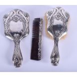 AN ART NOUVEAU SILVER MIRROR and a brush etc. (3)