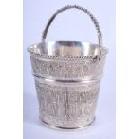 A MIDDLE EASTERN IRANIAN SILVER BUCKET. 4.4 oz. 12 cm high inc handle.