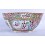 A LARGE 19TH CENTURY CHINESE CANTON FAMILLE ROSE BOWL Qing, painted with figures and landscapes. 30
