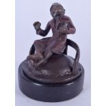 A COLD PAINTED BRONZE PAPERWEIGHT, in the form of a seated somoking monkey. 7 cm x 6 cm.