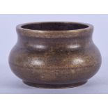 A CHINESE MINIATURE BRONZE CENSER, signed. 3.25 cm wide.