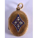 A VICTORIAN 15CT GOLD AND ENAMEL PENDANT. 6.2 grams. 2 cm x 2.5 cm.