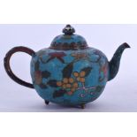 A CHINESE CLOISONNE ENAMEL TEA POT, decorated with foliage, signed. 16 cm wide.