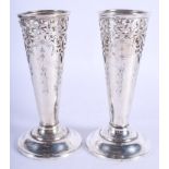 A PAIR OF VINTAGE TIFFANY & CO SILVER VASES. 9.2 oz. 15 cm high.