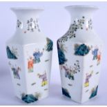 A PAIR OF CHINESE FAMILLE ROSE PORCELAIN VASES. 22.5 cm high.