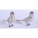 A PAIR OF VINTAGE CONTINENTAL WHITE METAL GAME BIRDS. 17 cm x 8 cm.