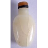 AN EARLY 20TH CENTURY CHINESE WHITE JADE CARVED SNUFF BOTTLE. 6.5 cm long.