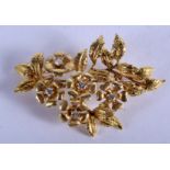 A FINE 18CT GOLD AND DIAMOND FANCY FLOWER BROOCH. 17 grams. 5.5 cm x 3.5 cm.