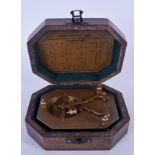 A CASED SUNDIAL COMPASS. 14.5 cm wide.