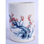 A CHINESE PORCELAIN BRUSH POT, decorated with foliage. 10.5 cm high.