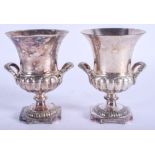 A PAIR OF VINTAGE SILVER PLATED WINE COOLERS. 11 cm high.