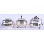 THREE ANTIQUE CONTINENTAL SILVER TEA CADDIES. 18.7 oz. Largest 11 cm wide. (3)